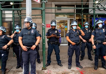 Cops wearing masks and face shields