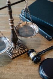 symbols of justice and law on the table of the judge