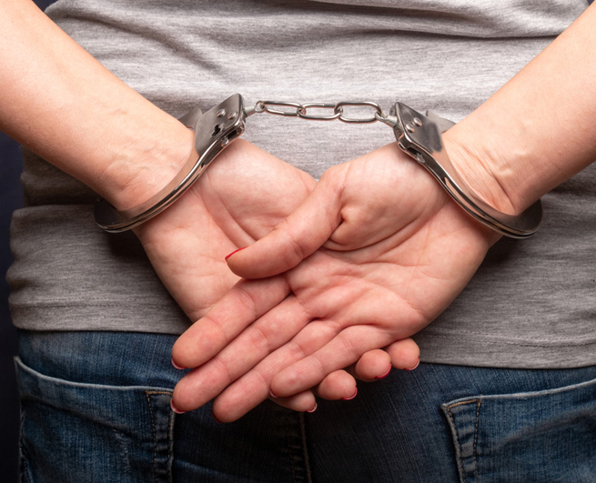 An individual in handcuffs