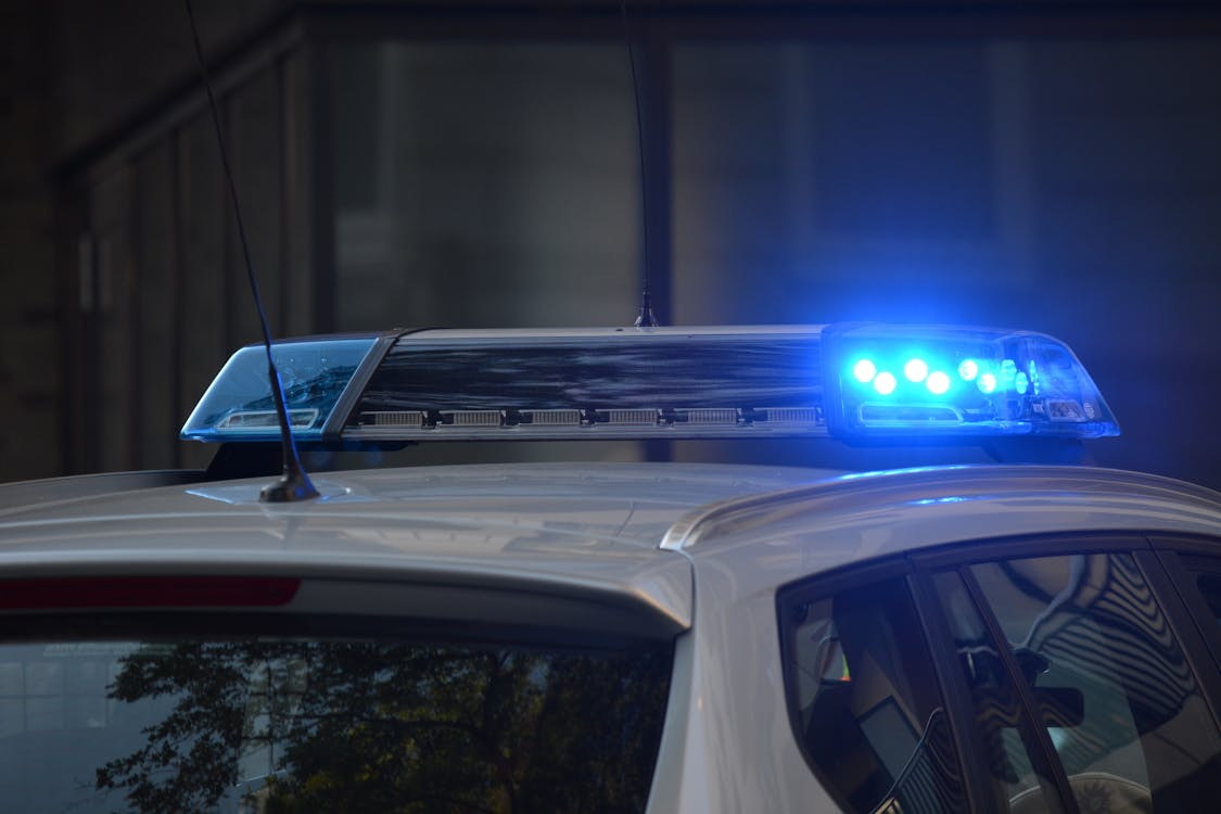 A police car with lights on.