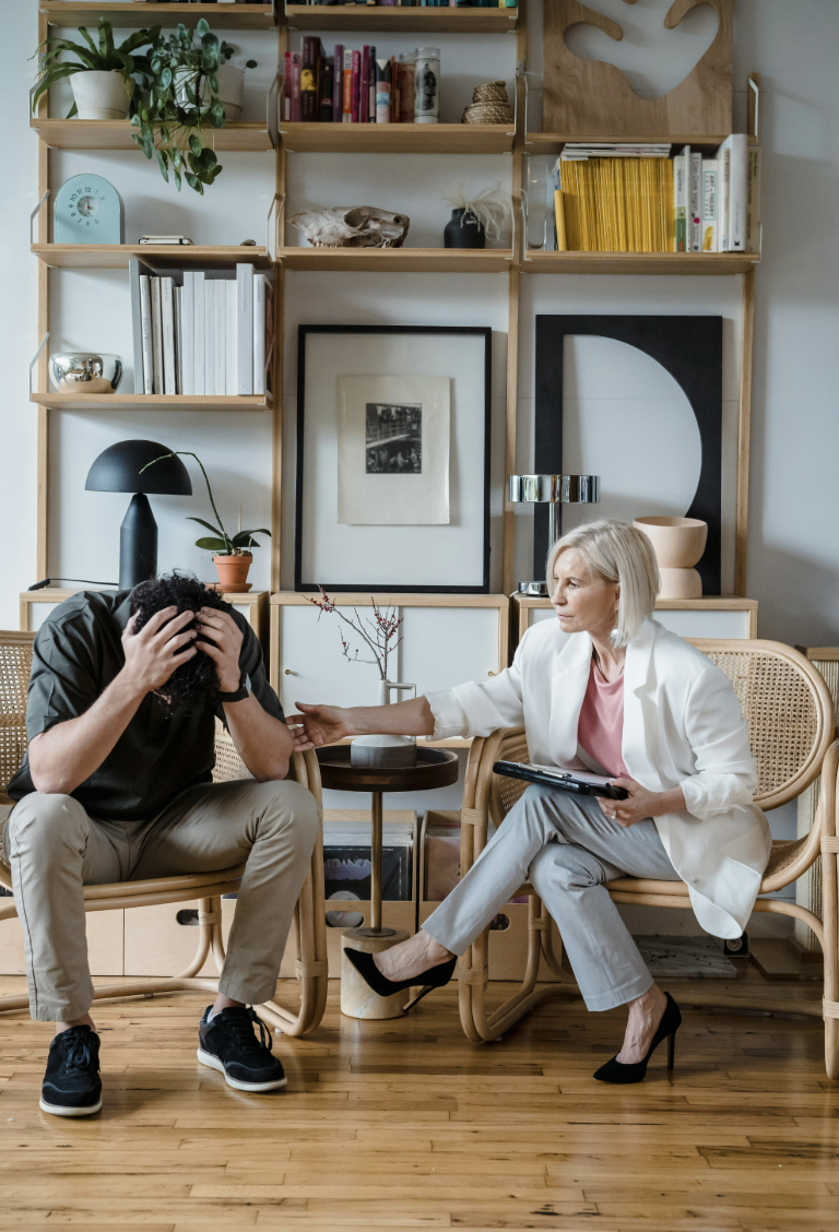 This photo shows a bail agent explaining documents to a concerned client.