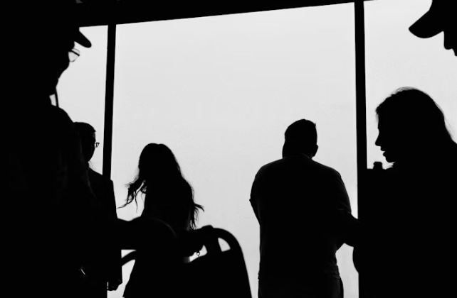 This image shows a group of people standing next to each other.