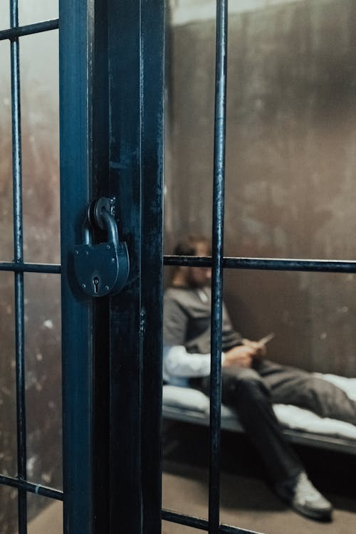 a man inside a jail cell