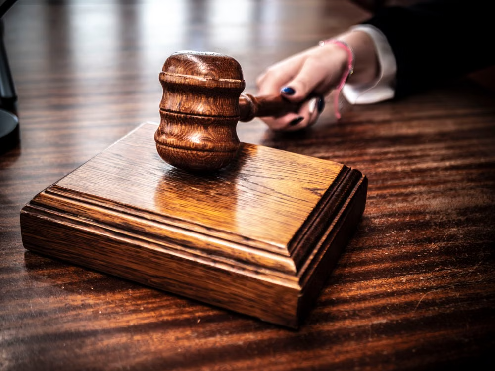 This photo shows a wooden gavel.